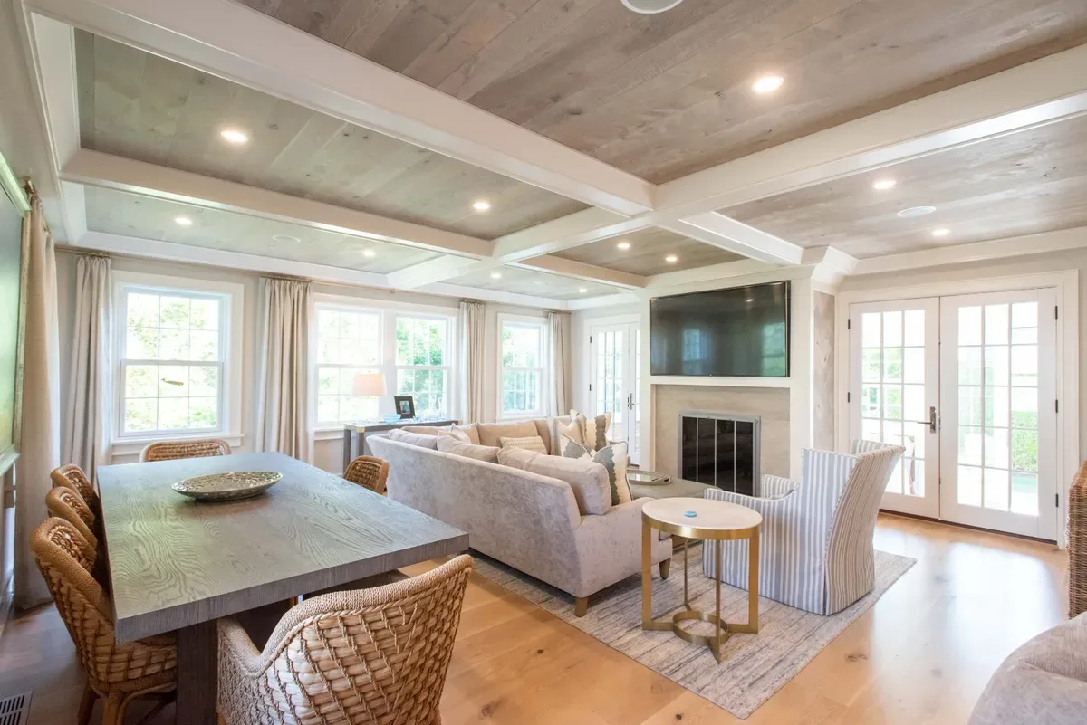 Long farmhouse dining table in the living room, seating ten