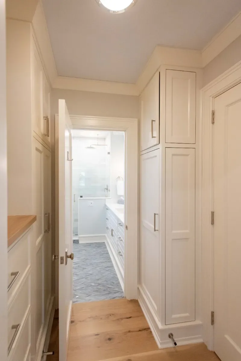 Side entry transition space with custom built-in cabinetry